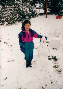 Snow beckons Lake Oswegans, like our daughter Riley a few years back, to come out and play.