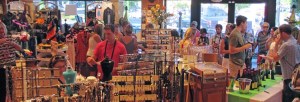Wine Walk attendees get an opportunity to sample wines while getting to know local retailers, like Accessories from the Heart, in downtown Lake Oswego.